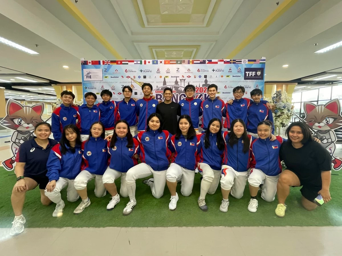 Fencers and coaches of the Philippine Junior’s Team (back row from left) James Lim, Jacob Leh, Derek Perez, Antonio Gregorio Manuel, Nathan Palma, coach Michael Nicanor, Louis Shoemaker, Dean Myers, David Ong, Jethro Chan, (front row from right) coach Justine “Stang” Tinio, Willa Galvez, Jodie Tan, Hagia del Castillo, Sophie Catantan, Victoria Ebdane, Miyake Capina, Jada Divinagracia, Yuna Canlas and coach Wilhelmina “Bing” Lozada are ready for the 2025 Bangkok FIE Foil Junior World Cup set December 13 to 15 at the Diamond Hall, Zeer Ransit Shopping Mall in Don Mueang, Bangkok, Thailand. (Ishoot Isports PH)

