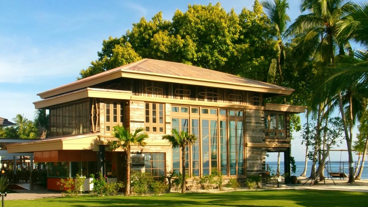 ANCESTRAL TABLE The exterior of Tiya’s House at South Palms Panglao, its beachfront structure setting the tone for an intimate dining experience rooted in Filipino hospitality and place
