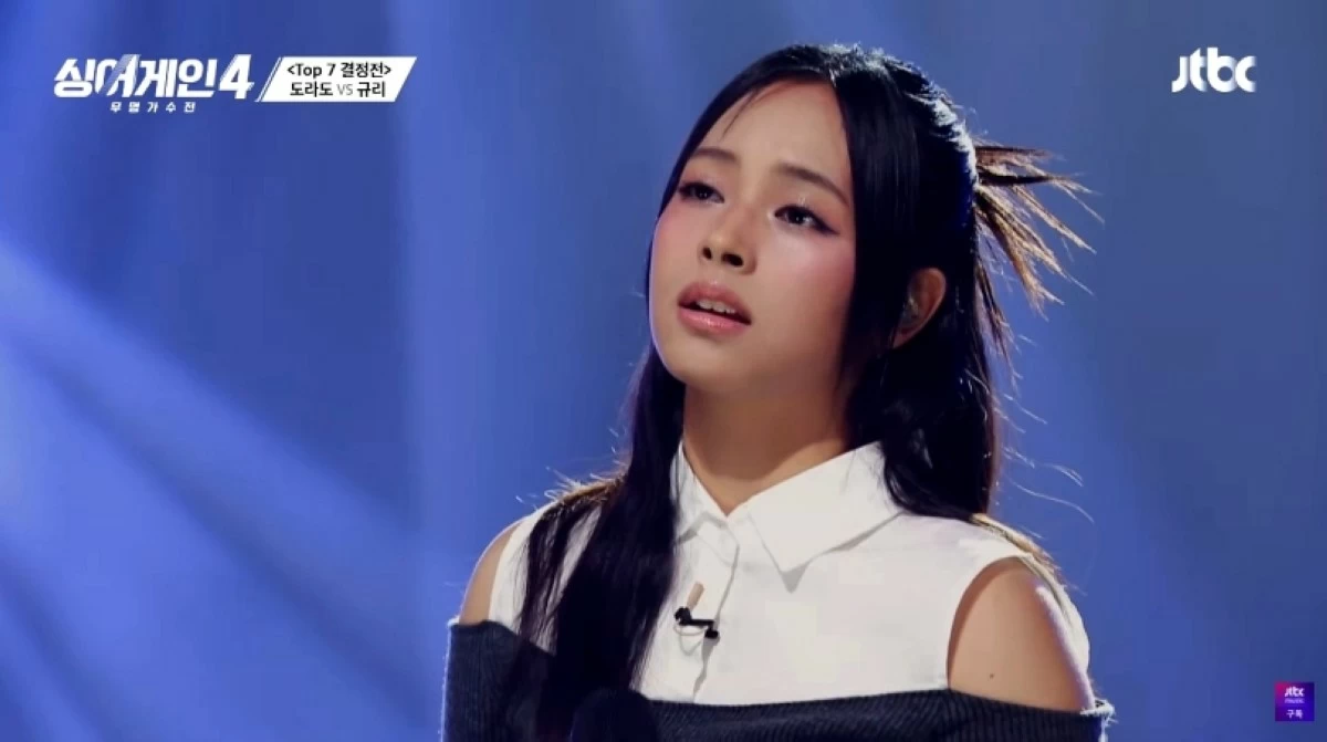 Filipino singer Gwyn Dorado performing Roy Kim's 