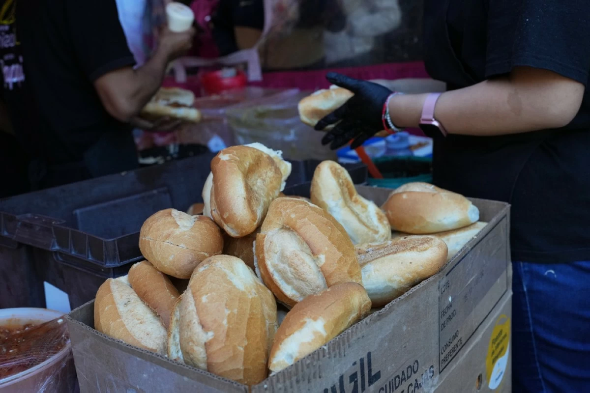 Bolillos, a traditional Mexican bread, for sale at a street stand in Mexico City, Thursday, Dec. 18, 2025. (AP Photo/Marco Ugarte)