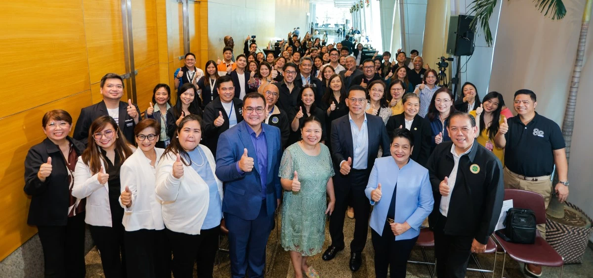 Representatives of medical, pharmacist, drugstore, and chemist associations join Unilab employees in formalizing their commitment to quality medicines. The thumbprint represents the seal of Quality Alaga found in every Unilab product.