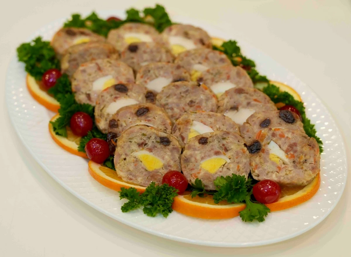 CHRISTMAS STAPLE Embotido by Chef RV Manabat, a make-ahead pork loaf studded with egg, cheese and ham, traditionally served sliced for Noche Buena.
