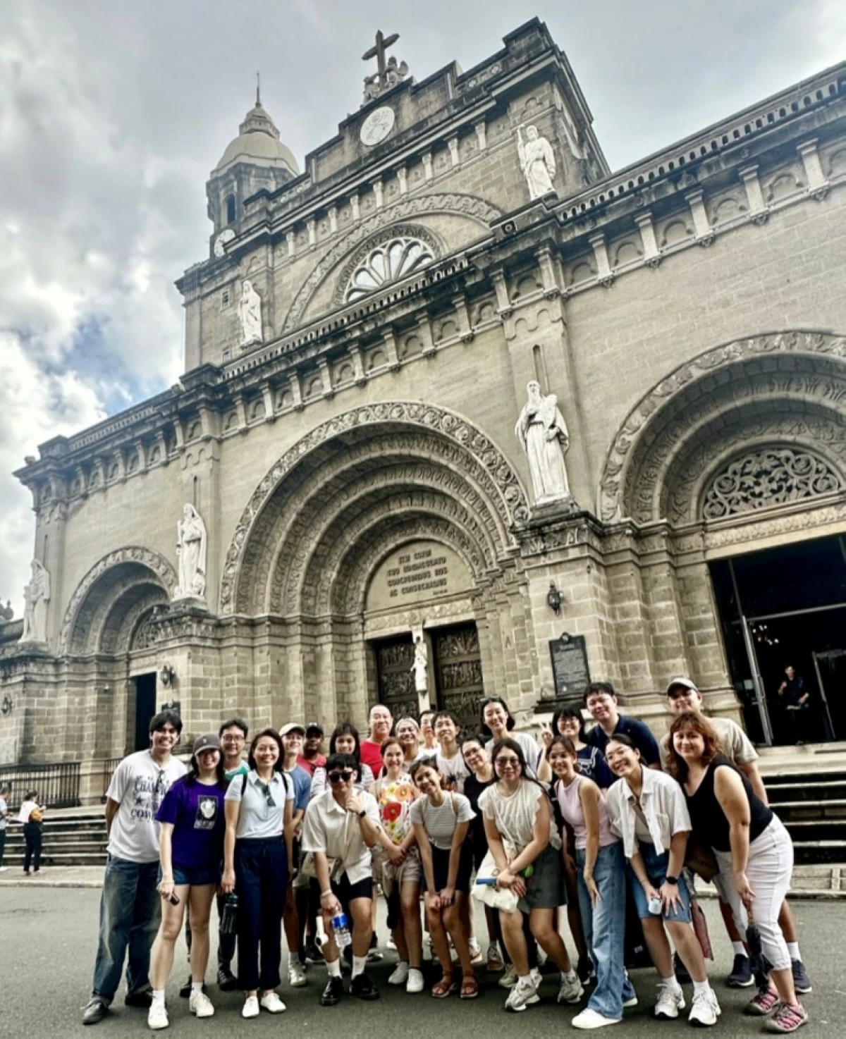 Ambassador See Sin Yuan Angelita Constance (4th from left) with the official embassy family in front of the Manila Cathedral in Intramuros, Manila City
