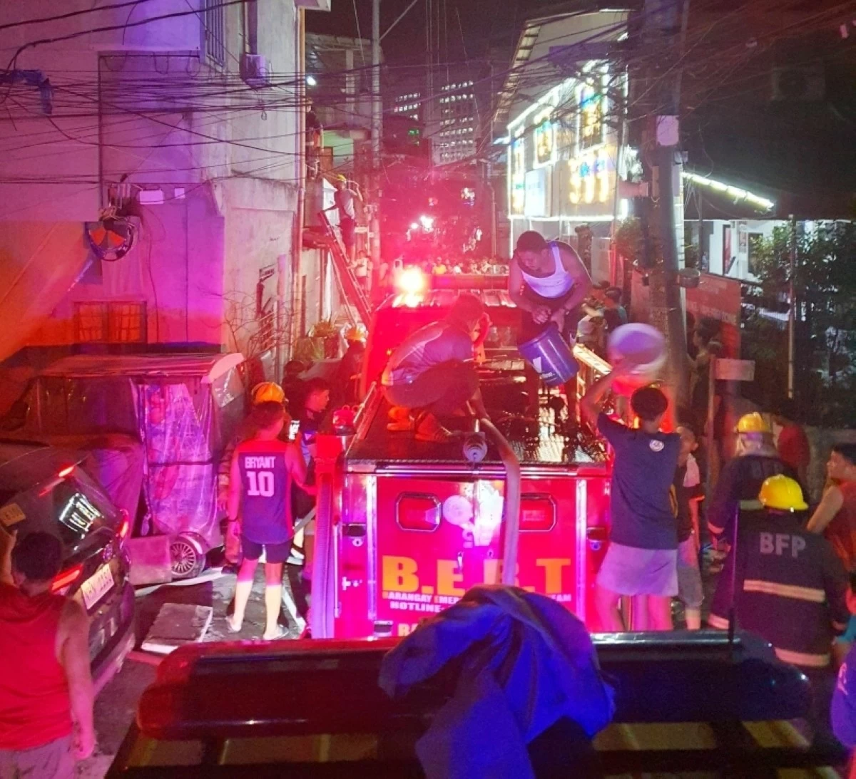 The fire in Barangay Post Proper Southside in Taguig on Dec. 24 (Photo from Pembo Fire & Rescue Brigade on Facebook) 
