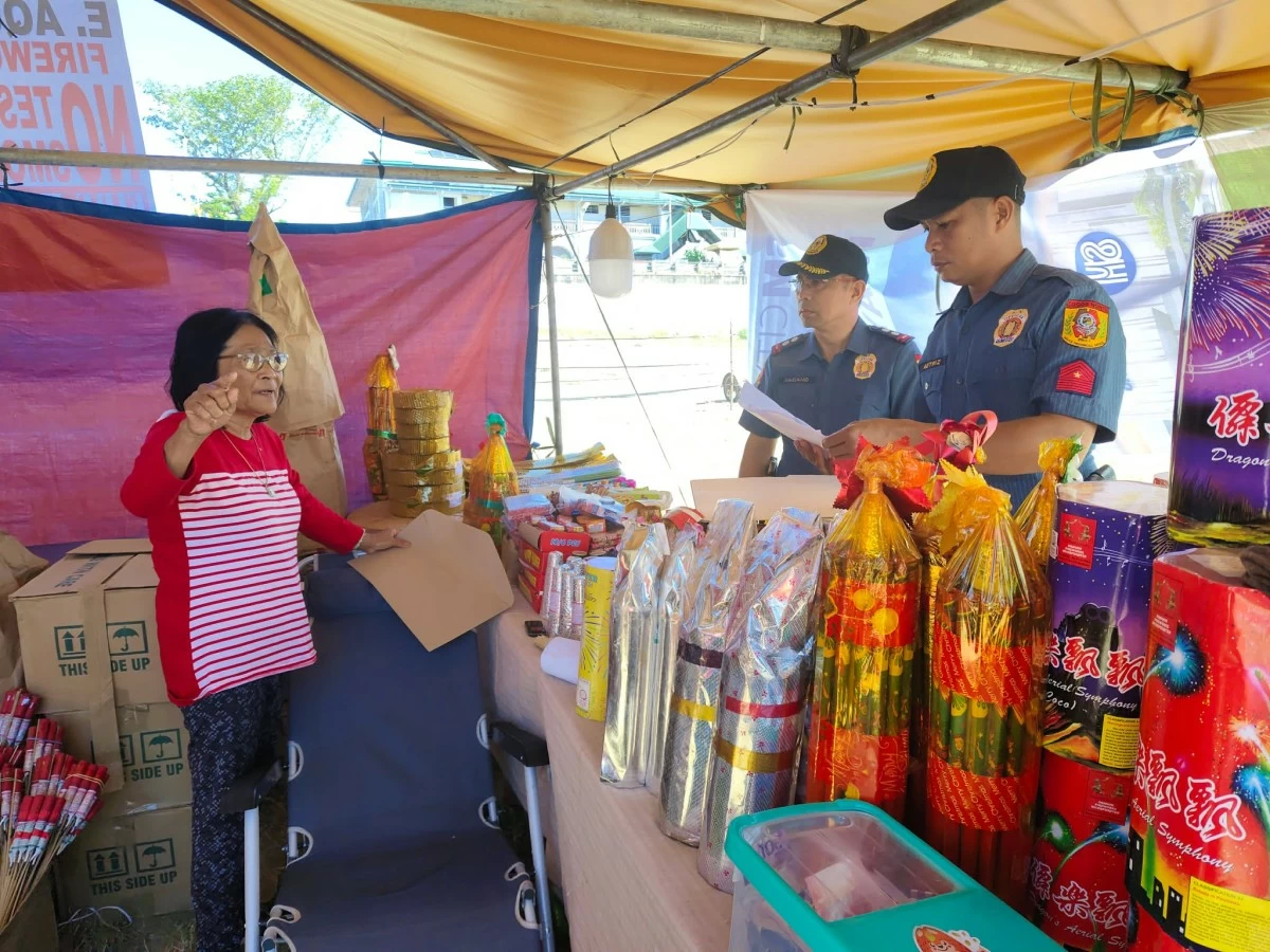 POLICE inspecting a fireworks store in Laoag City. (LCPS FB)