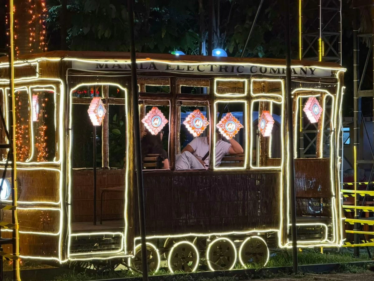 Visitors explore a replica of the Tranvia, paying tribute to Meralco’s 120-year history as Manila’s original electric tram provider.