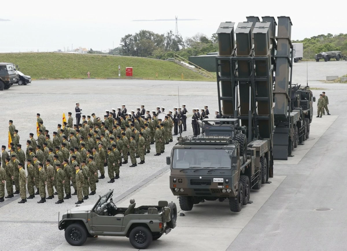 Type-12 surface-to-ship missile launchers are seen at the inauguration ceremony of a missile regiment of the Japan Ground Self-Defense Force in Uruma, Okinawa, southern Japan, on March 30, 2024. (Kyodo News via AP)