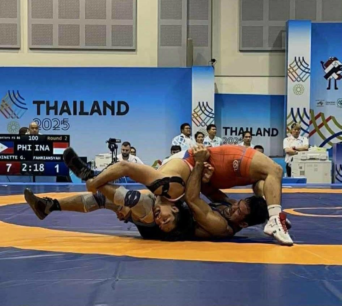 Gabriel Thomas Dinette (red uniform) in action during 33rd SEA Games in Thailand.