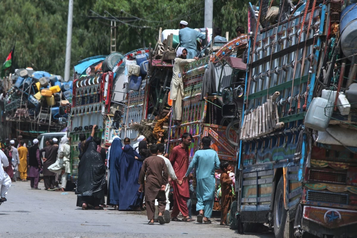 AFGHAN refugee families heading back to their homeland gather next to trucks loaded with their belongings as they wait for documentation at the UNHCR Voluntary Repatriation Center in Azakhel, Nowshera, a district of Pakistan's Khyber Pakhtunkhwa, Monday, Aug. 25, 2025. (AP)