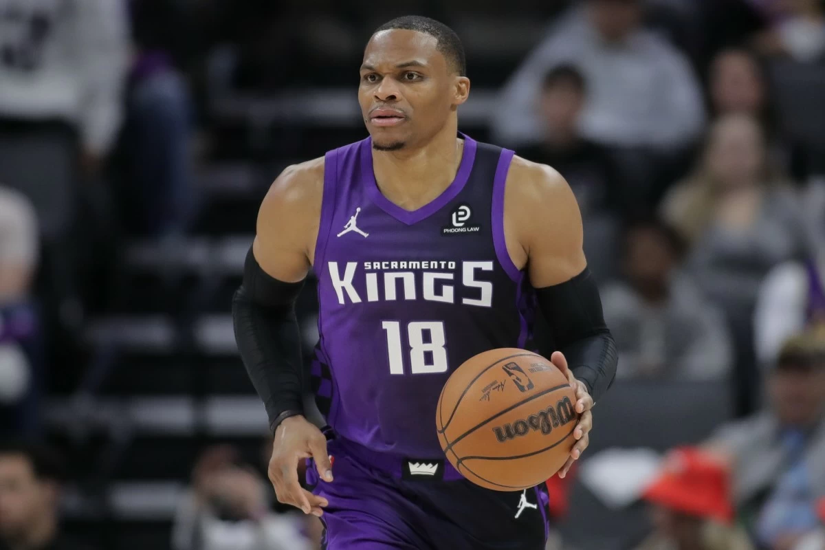 Sacramento Kings guard Russell Westbrook dribbles during the second half of an NBA basketball game against the Dallas Mavericks, Saturday, Dec. 27, 2025, in Sacramento, Calif. (AP Photo/Scott Marshall)