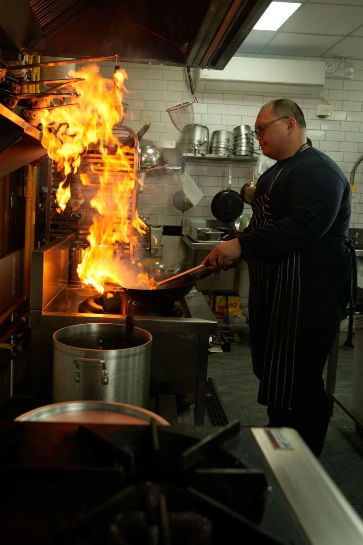 AT THE HELM Executive Chef Carlos Lanzona.