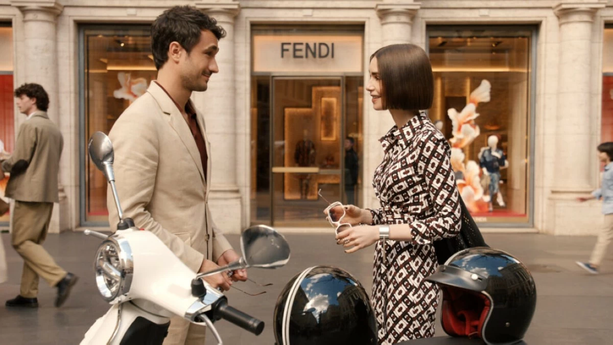 Eugenio Franceschini as Marcello and Lily Collins as Emily Cooper (Photo from Netflix)