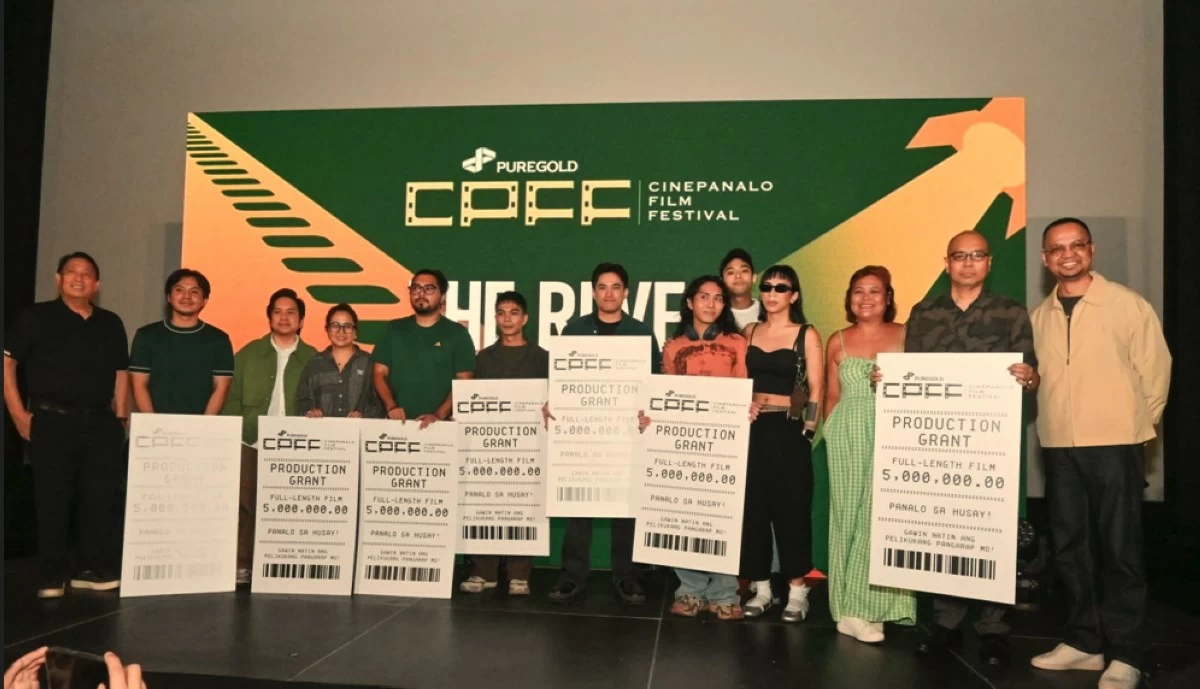 Representatives of the seven official entries for the 2026 Puregold CinePanalo run pose during the special announcement of the top seven full-length movies held at Gateway Cinema in Araneta City last Oct. 25. At right is Chris Cahilig, festival director.