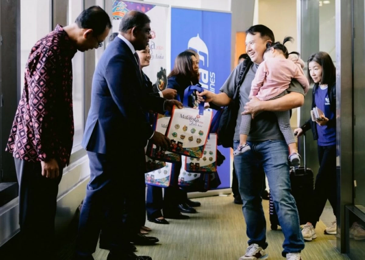Passengers experience the warm Malaysian hospitality as soon as they board the aircraft