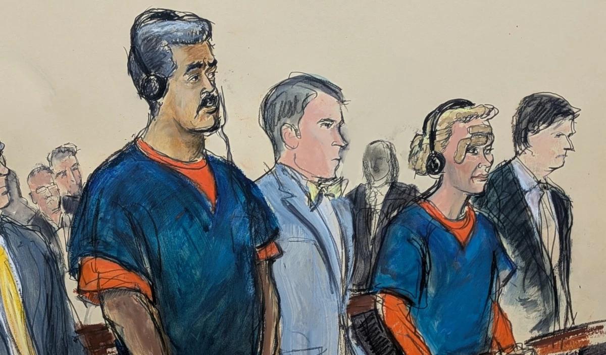In this courtroom sketch, Venezuelan President Nicolas Maduro, left, and his wife, Cilia Flores, second from right, appear in Manhattan federal court with their defense attorneys Mark Donnelly, second from left, and Andres Sanchez, Monday, Jan. 5, 2026, in New York. (Elizabeth Williams via AP)