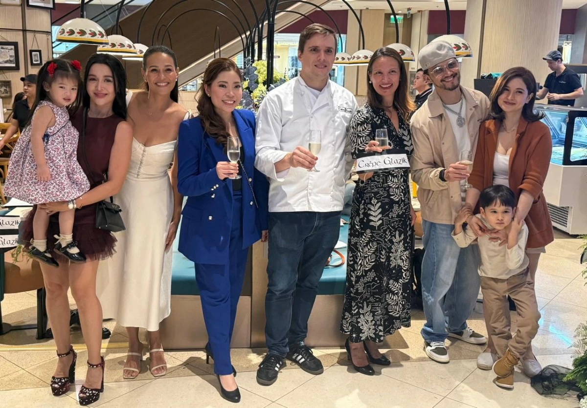 At the opening of Crepe Glazik: (from left) Kris Bernal and daughter, Iza Calzado, Nicole Charpentier, Neven Charpentier, French ambassador to the Philippines Marie Fontanel, Billy Crawford, and Coleen Garcia with son Amari