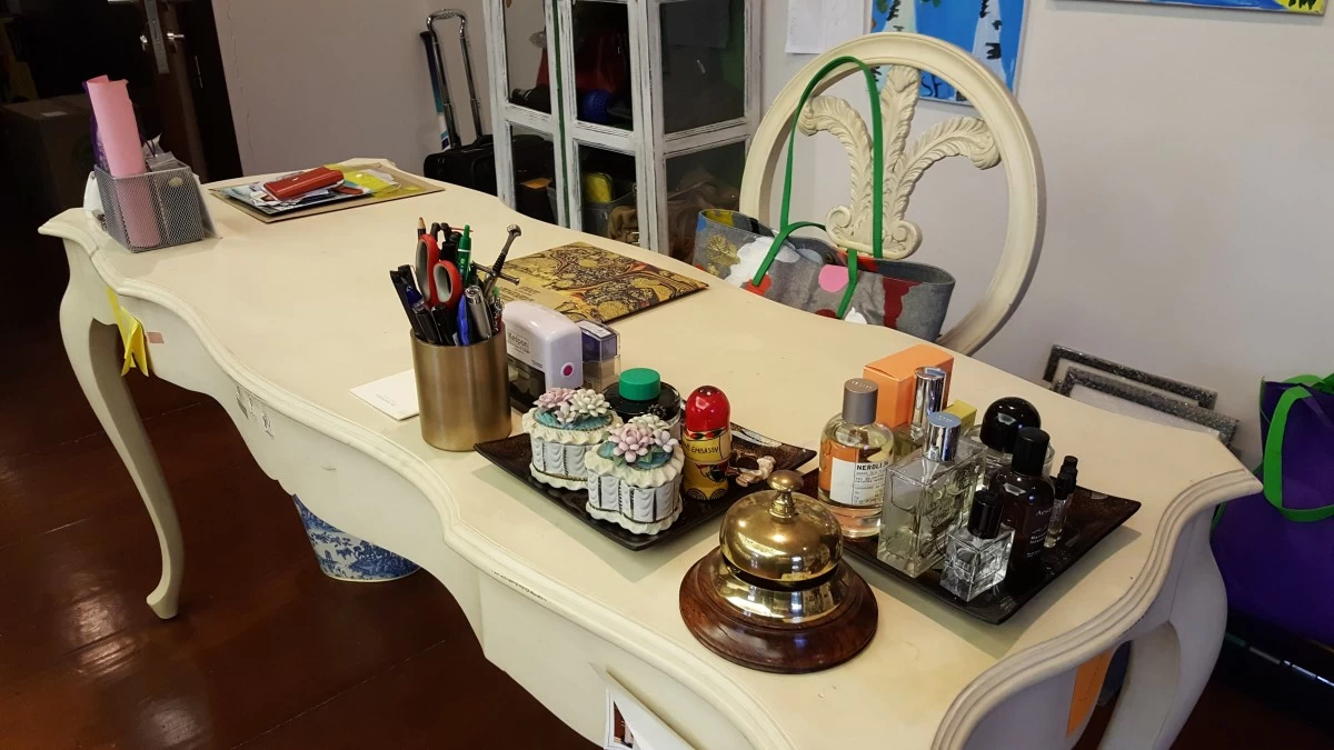 Make use of small trays to contain small items together creating a neat, pulled together look.