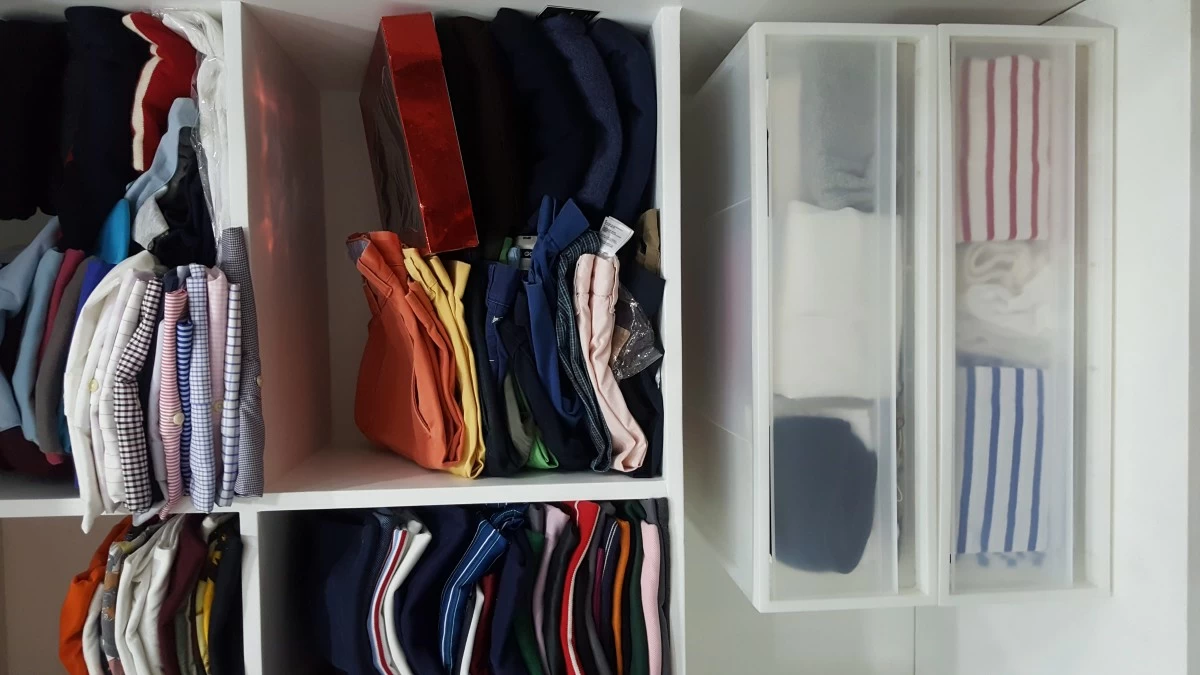 This is an example of how much neater keeping tops in drawers is vs. stacking them one on top of the other like we normally do.