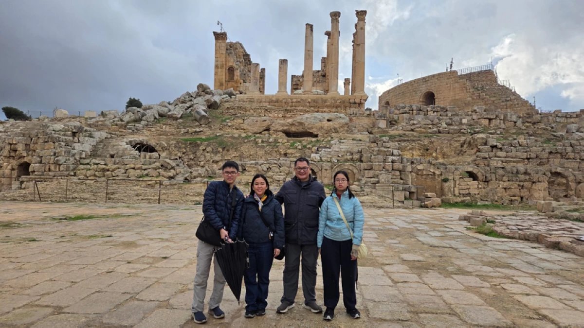 TRIBUTE TO THE SKIES The author with his family at the Temple of Zeus at Jerash.