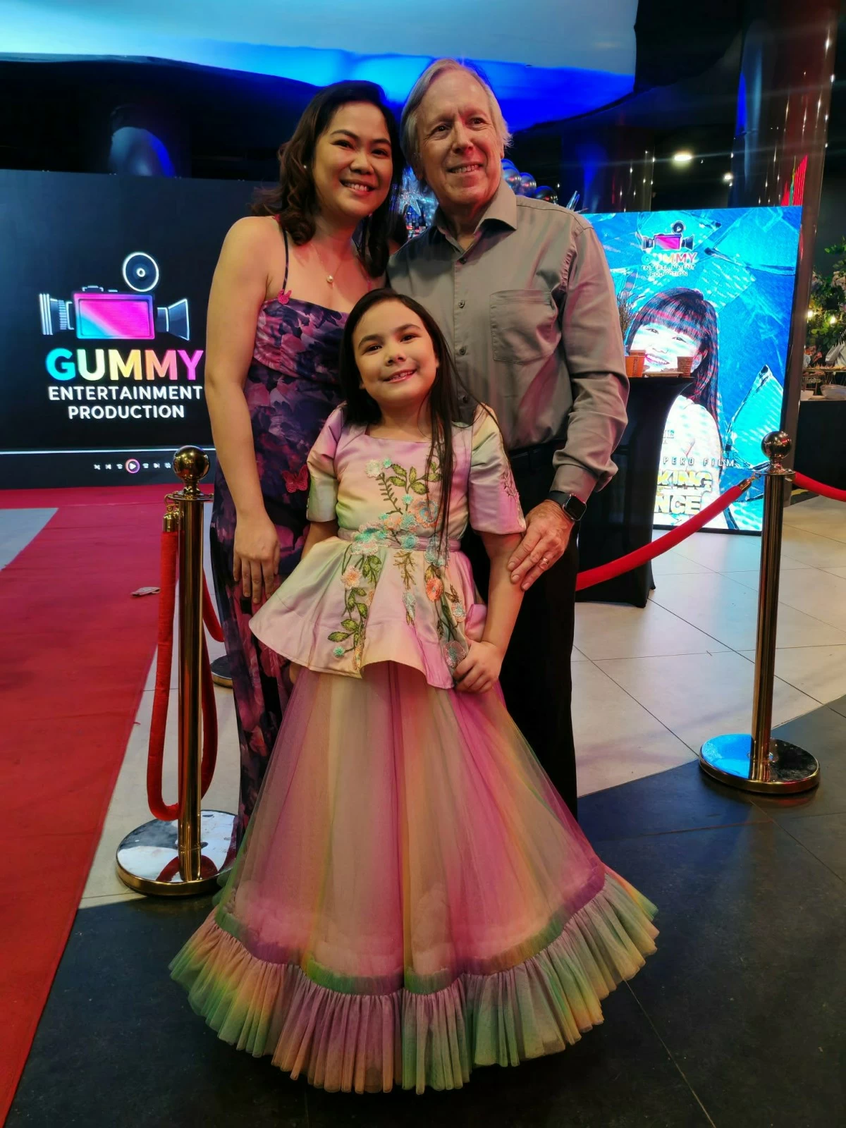 Producers Lawrence Weber and Mrs. Ann Michelle Weber, with daughter Gray