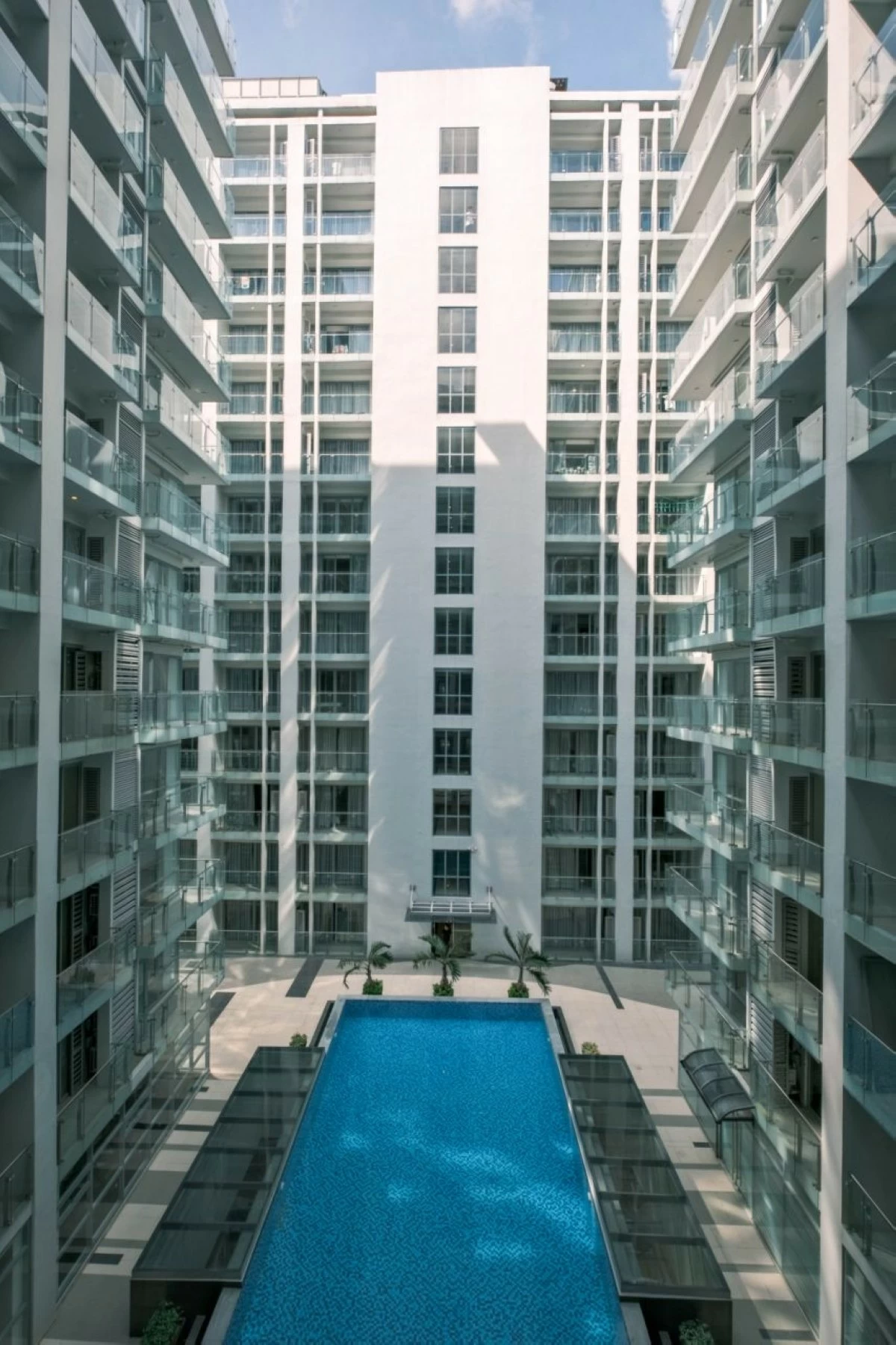 This perspective further showcases the pool at Wyndham Garden Manila Bay as a welcoming retreat for guests seeking balance between activity and relaxation.