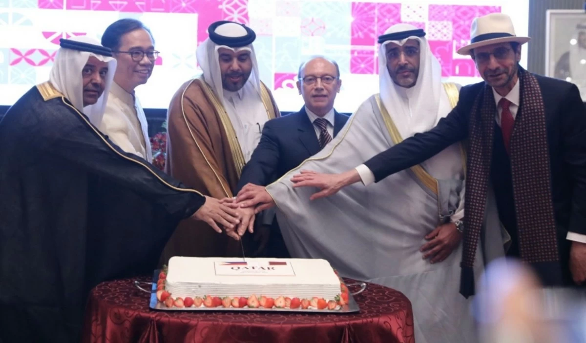 The ceremonial cutting of the celebratory cake was led by, from left, Ambassador Faisal Ebraheem Alajrafi Alghamdi of the Embassy of Saudi Arabia; Undersecretary Leo Herrera-Lim; Ambassador Ahmed bin Saad Al-Homidi; H.E. Mohammed Rida El-Fassi, ambassador of the Kingdom of Morocco and deputy dean of the Diplomatic Corps in the Philippines; Ambassador Meshari Yousef Muhammad Al-Nibari of the Embassy of Kuwait; and Ambassador Mounir Y.K. Anastas of the Embassy of Palestine.
