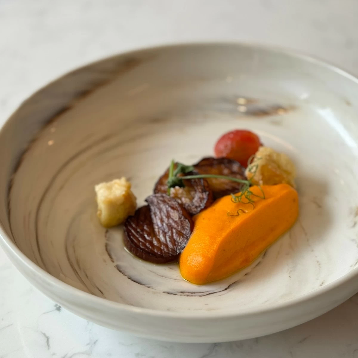 Mushroom Scallops served on tasting plate, available at the Plant-Based Buffet Station