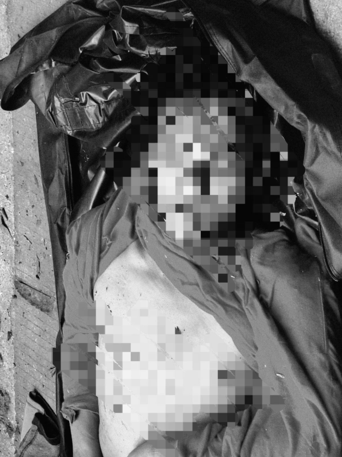 The unidentified man with gunshot wounds and handcuffed hands found along a roadside in Antipolo City. (Photo from Antipolo PNP)