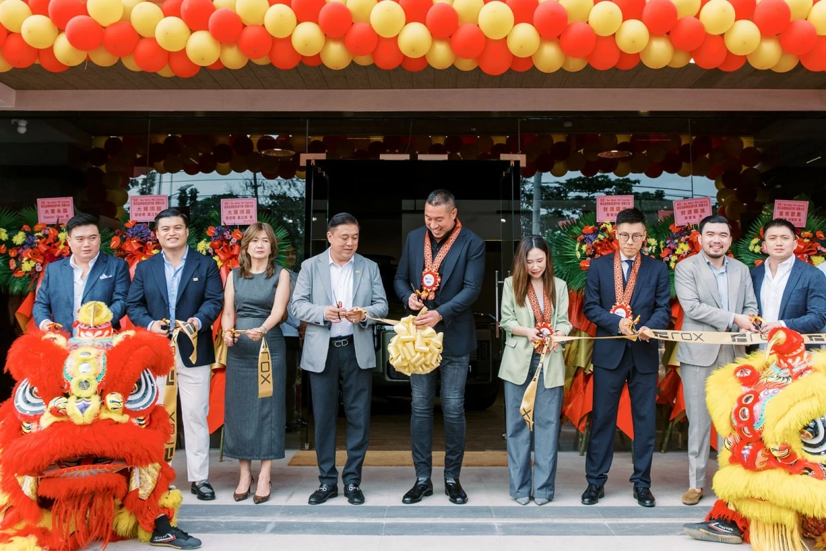 Transcorp, Inc. executives with San Juan Mayor Francis Zamora, cut the ribbon to the new Rox Greenhills showroom.