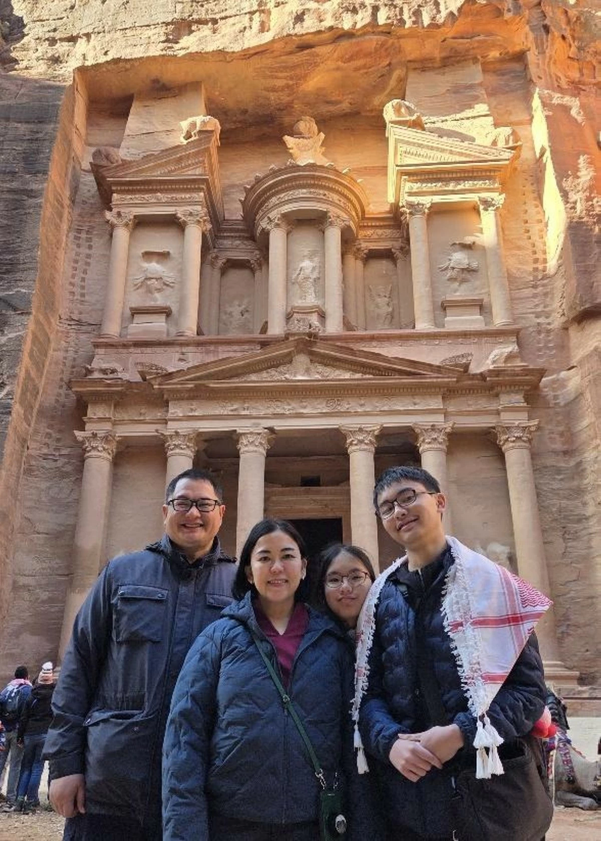ALL SMILES The author and his family at Al-Khazneh, Petra.