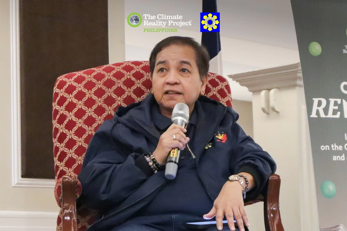 Department of Energy Undersecretary Mylene Capongcol sits down for a panel discussion with other GEOP stakeholders to talk about the ease of shifting to RE via the program.