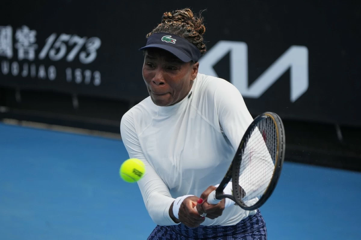 Venus Williams of the United States plays a backhand return during a practice session ahead of the Australian Open tennis championship in Melbourne, Australia, Friday, Jan. 16, 2026. (AP Photo/Dita Alangkara)