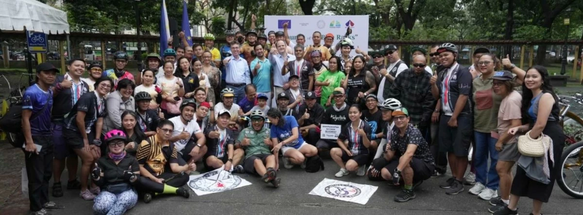 A united moment captured: EU Ambassador Massimo Santoro with NPDC Deputy Executive Director Jezreel Gaius Apelar alongside cycling association members and advocates.