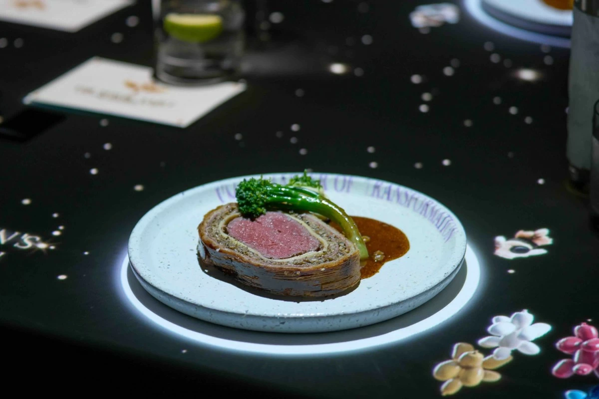 TABLESIDE DRAMA Mulwarra tenderloin beef Wellington, sliced tableside and served with bone marrow and café de Paris butter jus.