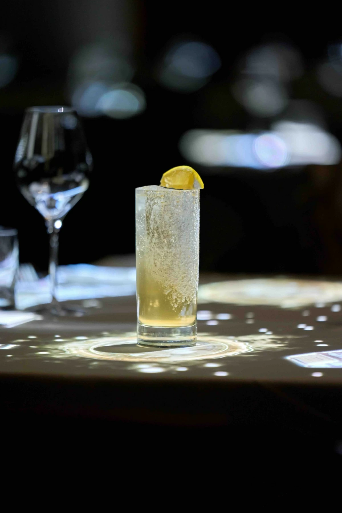 HIGHBALL TRICK The Canuplin Highball combines gin, toasted Japanese rice syrup, banana liqueur, and soda for a light, aromatic finish.