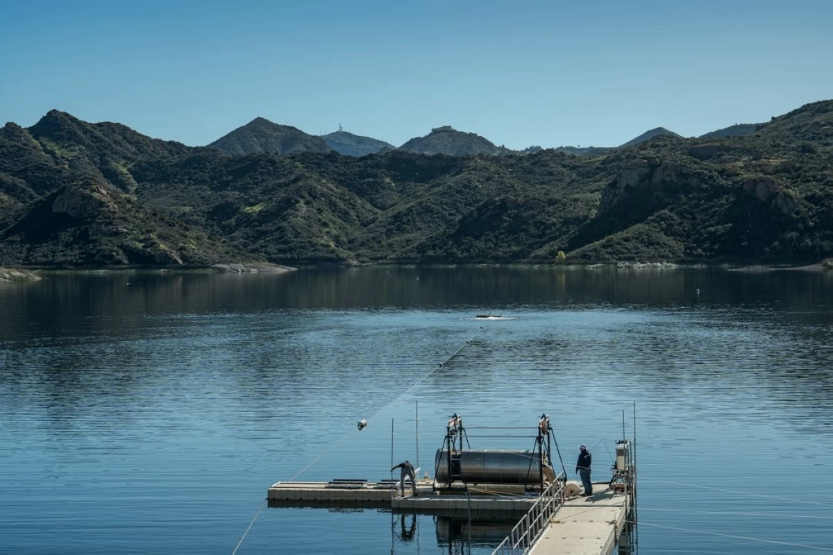 A prototype OceanWell reverse osmosis pod sits on the dock at the Las Virgenes Reservoir in Westlake Village, Calif., Monday, Dec. 1, 2025, where the deep sea desalination technology is being tested. (AP Photo/Annika Hammerschlag)