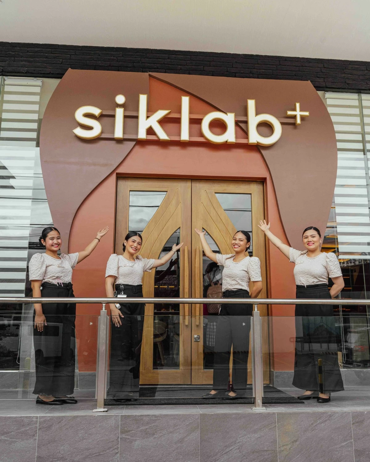 OPEN ARMS Siklab staff welcoming guests during the opening night, setting the tone for a relaxed and convivial dining experience.