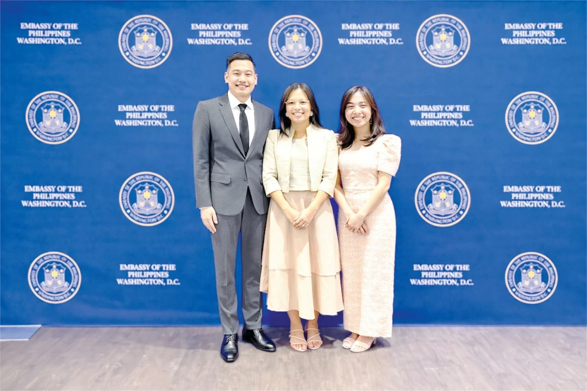 Anthony Esguerra, Geli Juani, and Cha Crisostomo attend the Philippine Independence Day reception at the Philippine Embassy in Washington, DC, in 2025.