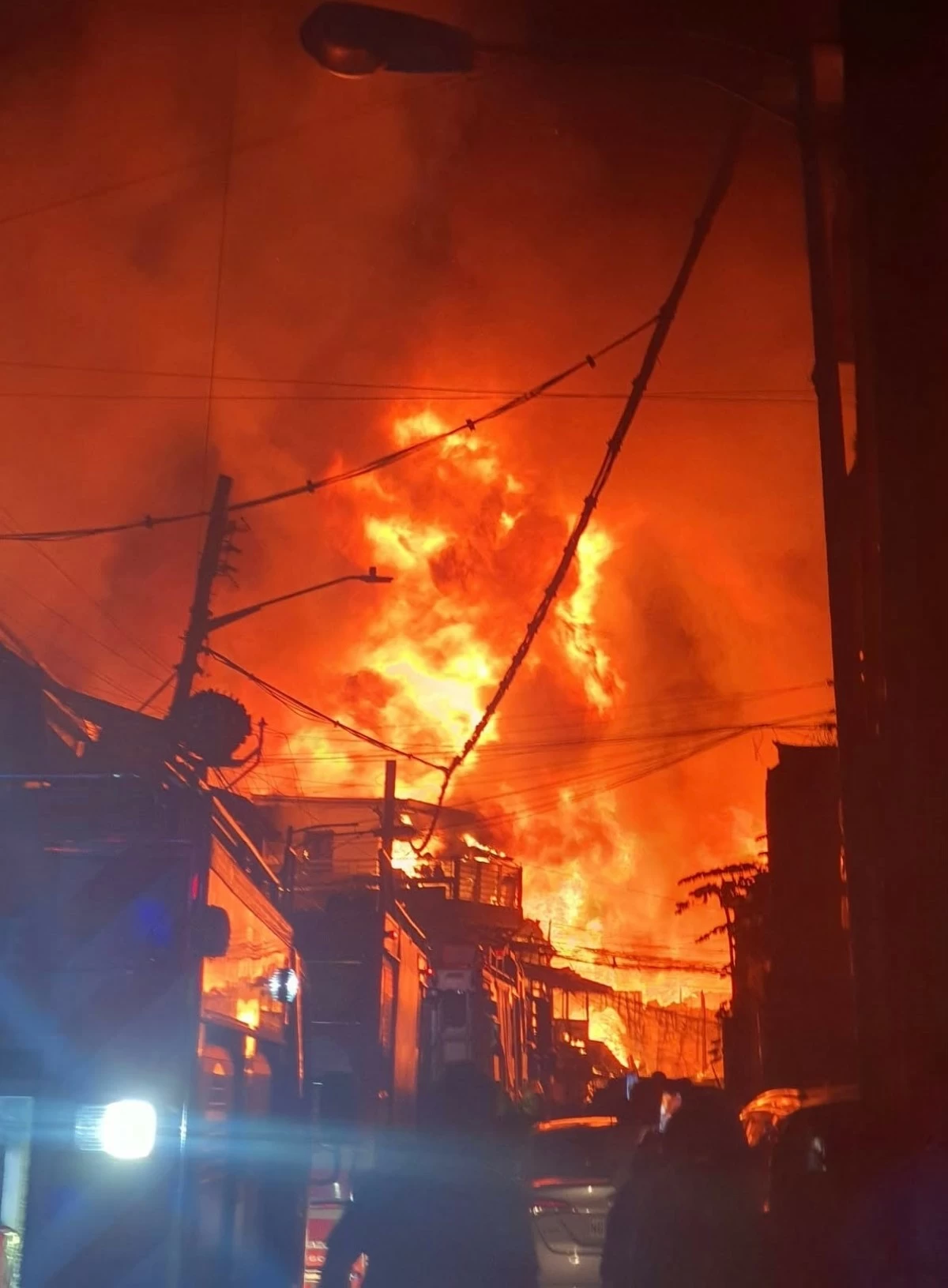 Firefighters respond to a third alarm fire in Barangay Tejeros, Makati City, on Saturday, Jan. 24. Two elderly people died while six others were given urgent medical attention in the incident. (Photo from Pembo Fire Volunteers Brigade)