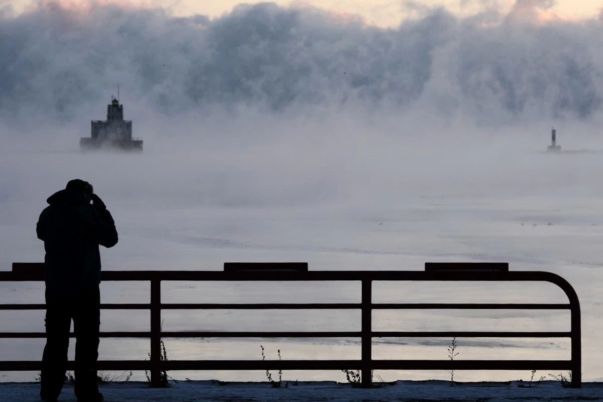A MAN watches as steam is seen over Lake Michigan as frigid temperatures for the day are not expected to reach zero degrees Friday, Jan. 23, 2026, in Milwaukee. (AP)