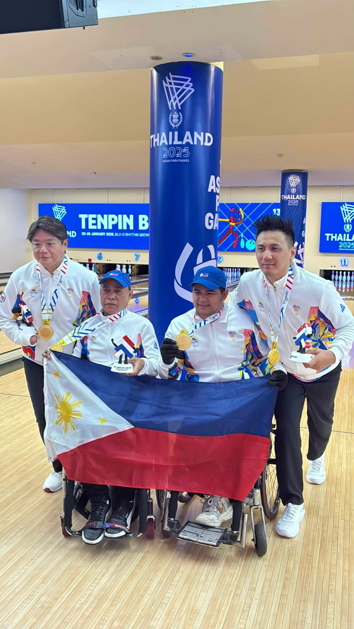 Gold medal winners Kim Ian Chi, from left, Francisco Ednaco, Jaime Manginga and Patrick Eusebio of the PH Para Bowling team. (George Manozo)