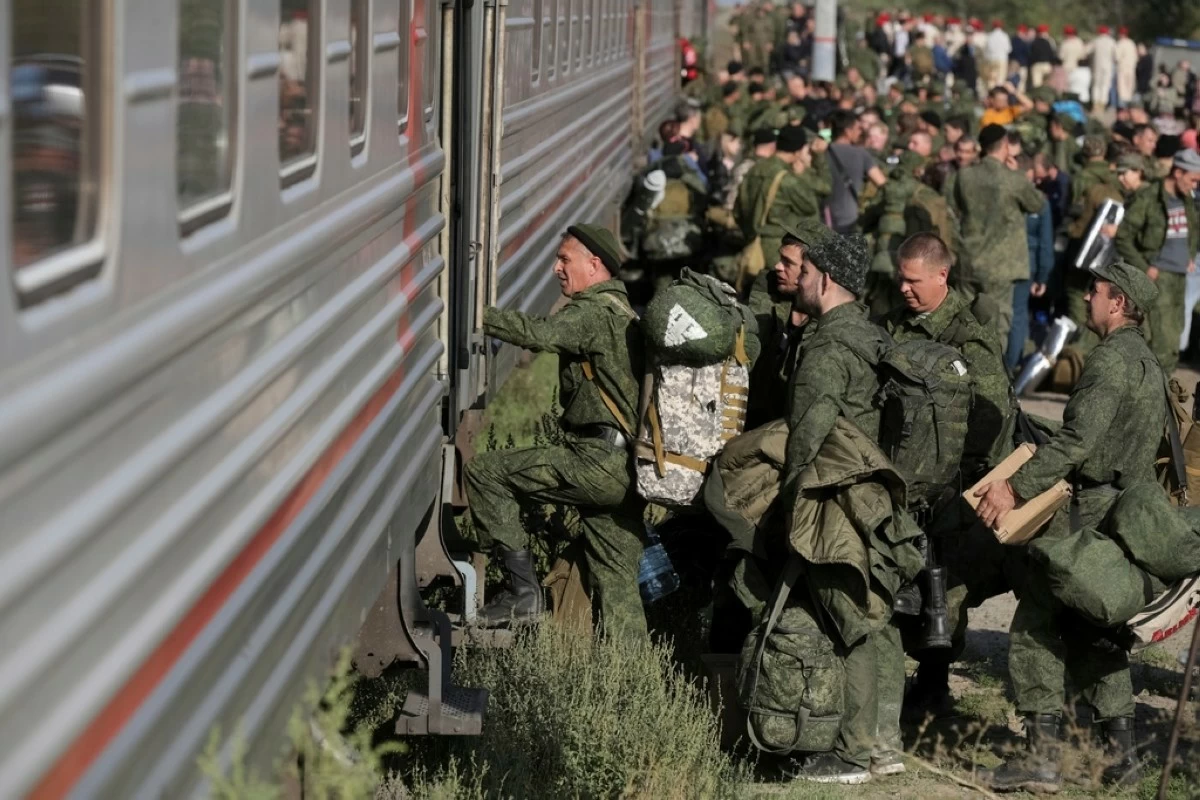 Russian recruits take a train at a railway station in Prudboi in the Volgograd region of Russia, Sept. 29, 2022. (AP Photo, File)