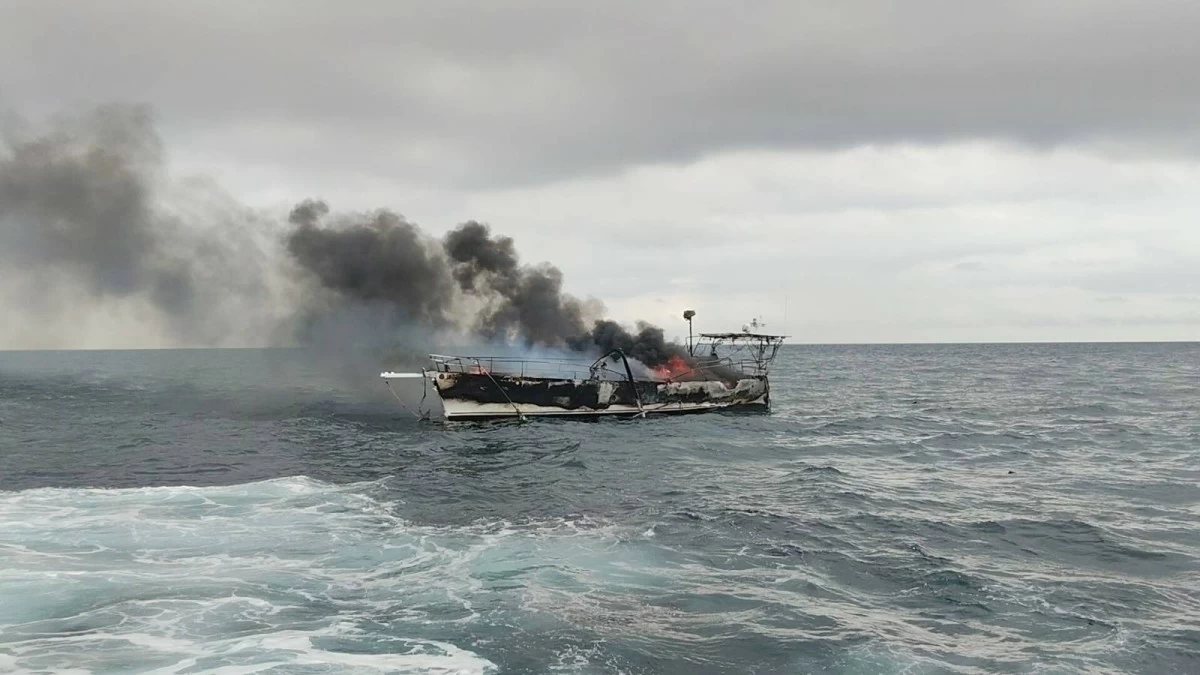 Motor yacht M/Y Allusive catches fire off Tingloy, Batangas on Jan. 27, 2026. Seven crew members were rescued from the ill-fated vessel. (Photo: Philippine Coast Guard)