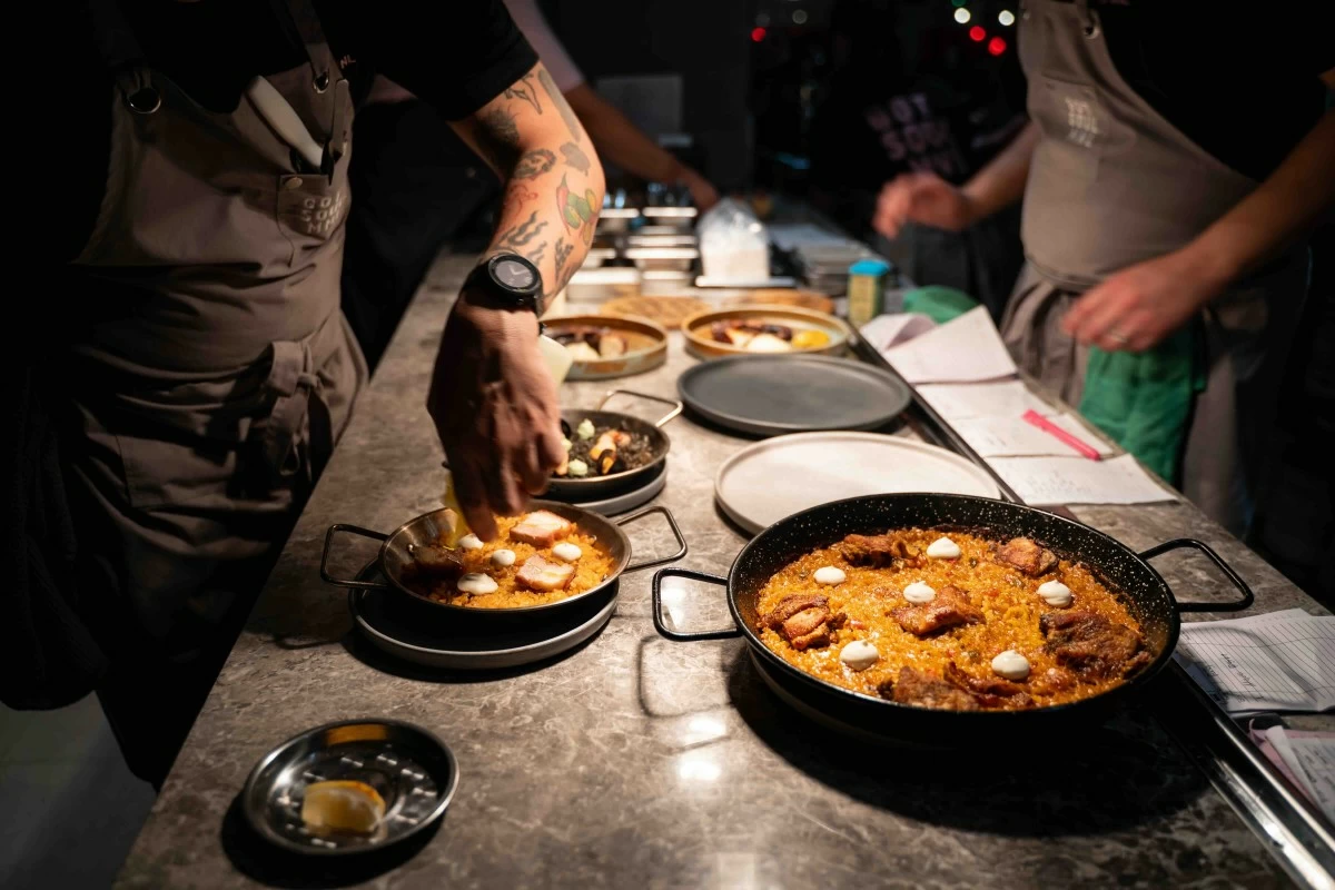 RICE IN MOTION The Chicken Inasal Paella is prepared fresh, bringing smoky flavors to the pan