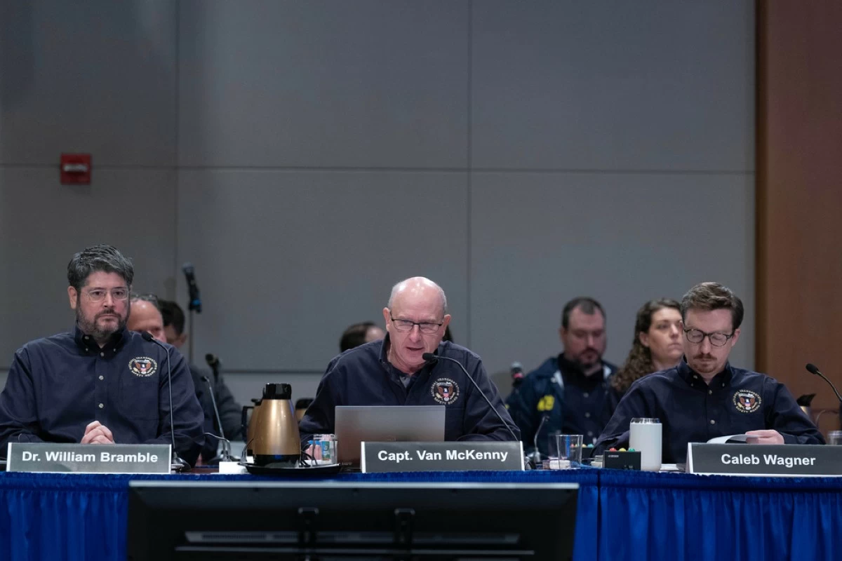 National Transportation Safety Board (NTSB) investigators William Bramble, from left, Captain Van McKenny and Caleb Wagner speak during the hearing on the midair aircraft collision that killed 67 people near Washington Reagan National Airport, in Washington, Tuesday, Jan. 27, 2026. (AP Photo/Jose Luis Magana)