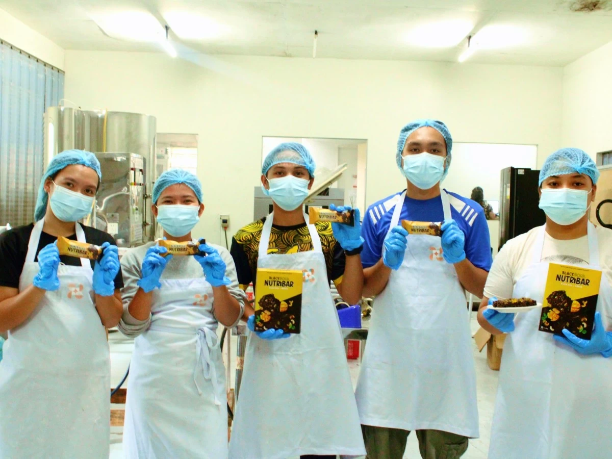 BlackGold Food Corporation team members present their Nutribar at the Caraga Food Innovation Center.