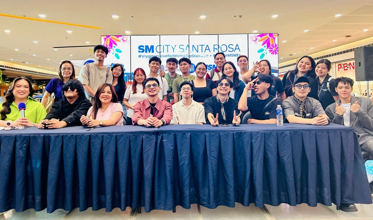 Cong TV, Viy Cortez, Ivy Cortez, and Rolly Cortez joined MSMEs and mallgoers during the VIYLine MSME Caravan at SM City Santa Rosa. During the VIYLine MSME Caravan opening at SM City Santa Rosa, Cong TV surprised the crowd by revealing himself onstage after posing as a cameraman. RIGHT PHOTO: Influencers and entrepreneur-creators met fans and shoppers during the VIYLine MSME Caravan at SM City Santa Rosa, bringing digital communities into real-world marketplaces. 