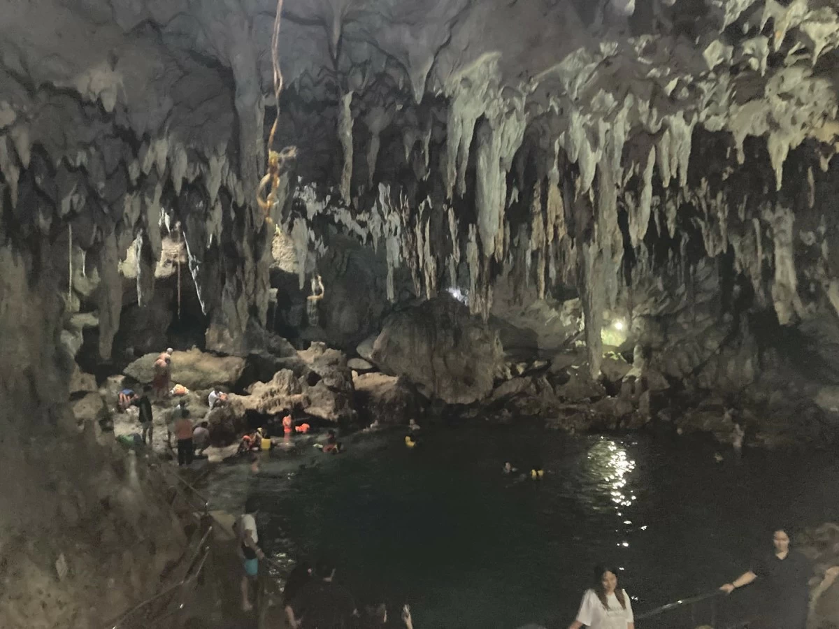 DEEP INSIDE Take a quick dip at the lagoon within Hinagdangan Cave.
