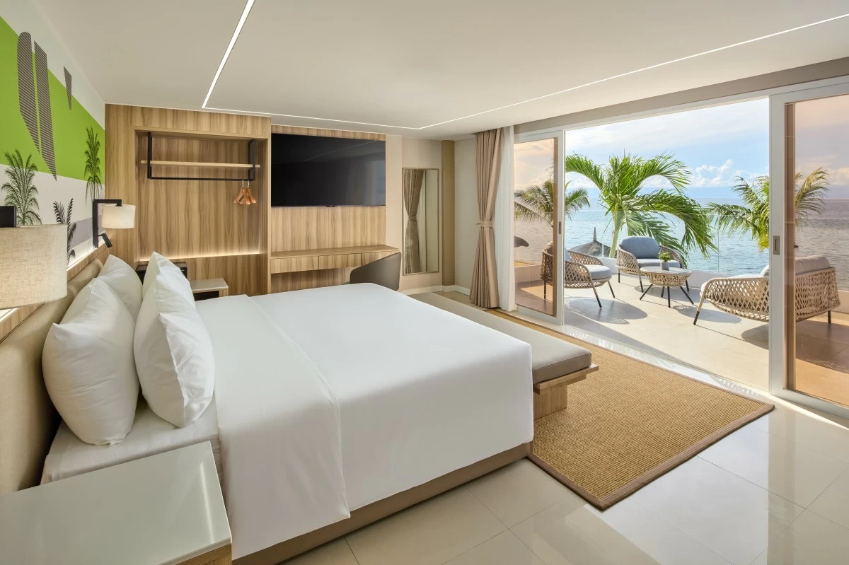 COMFORT IS KING Lime Resort Bohol's beachfront one bedroom duplex villa.