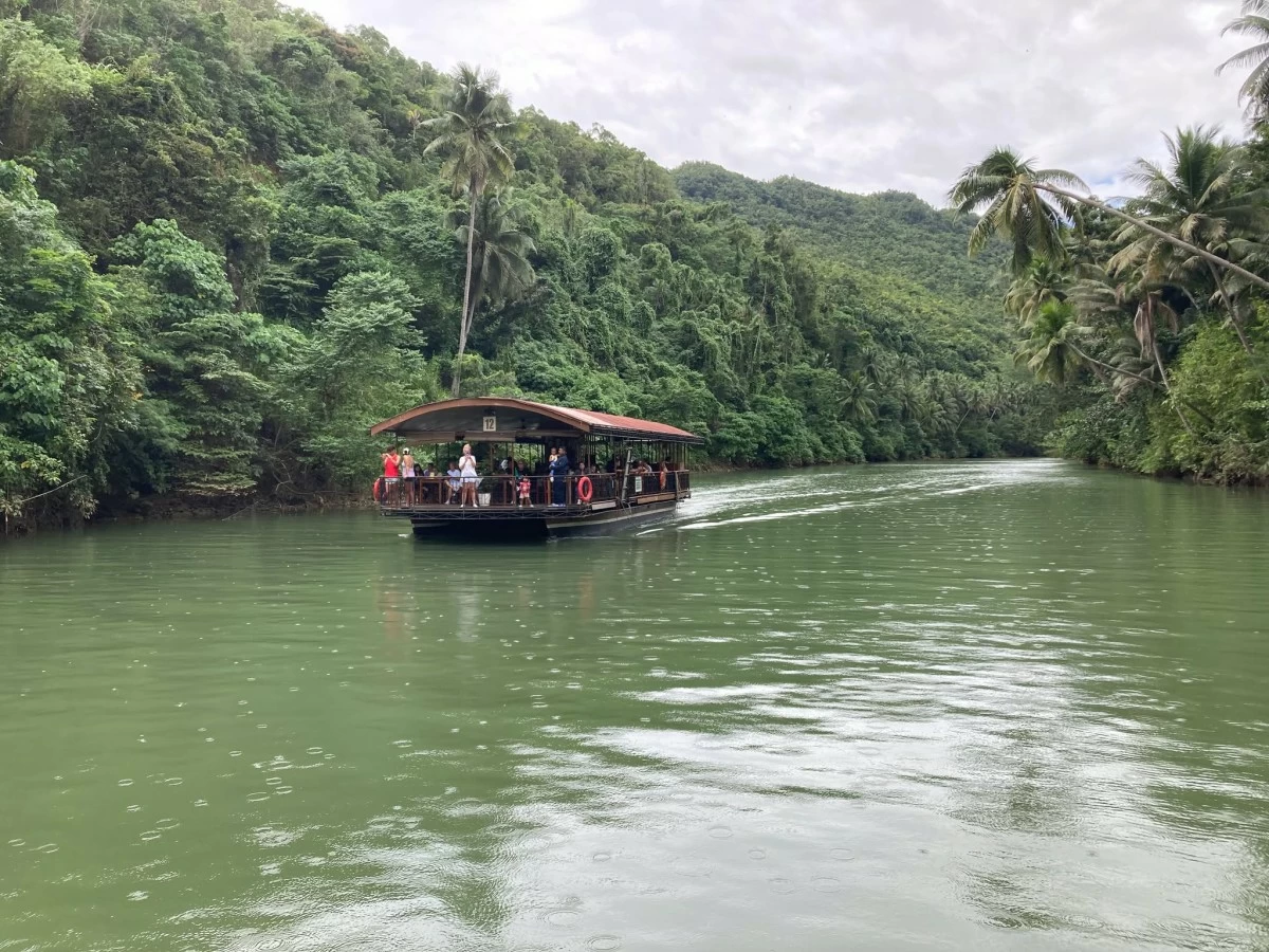 ONE WITH NATURE Marvel over trees, birds, and the splendid views along the Loboc River Cruise.